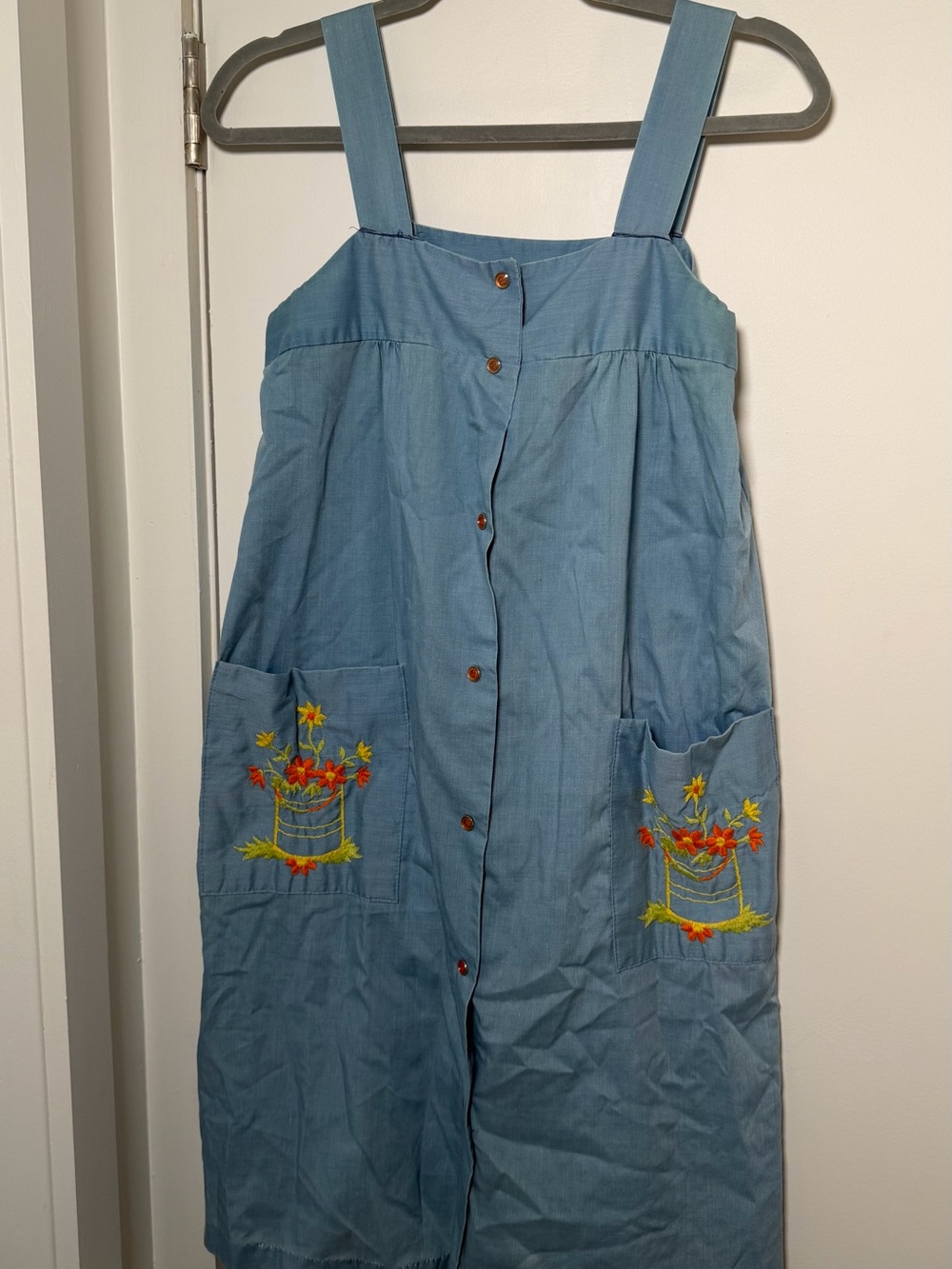 Button-Front Blue Cotton Jumper Dress with Floral Pockets